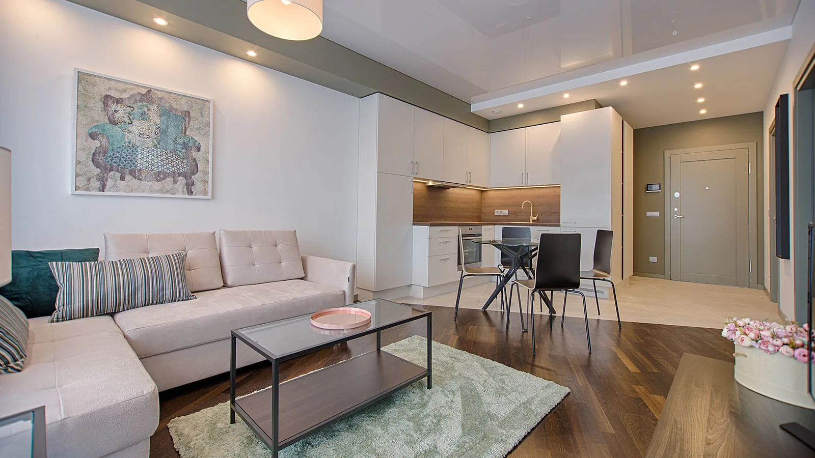 Bright open-plan living room and kitchen, freshly cleaned