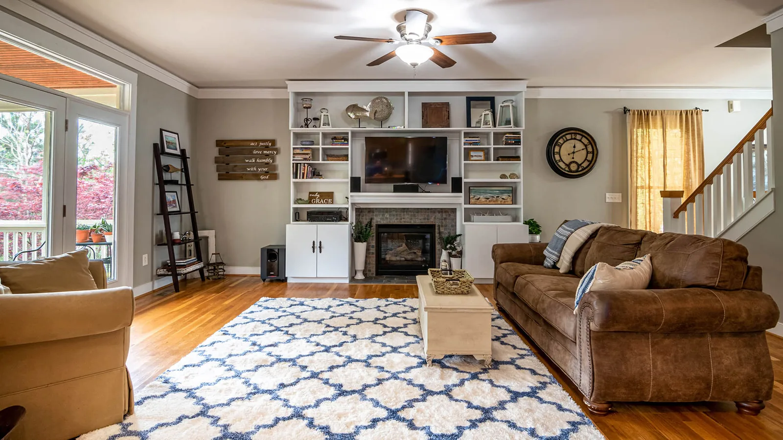 Freshly cleaned family living room with fireplace